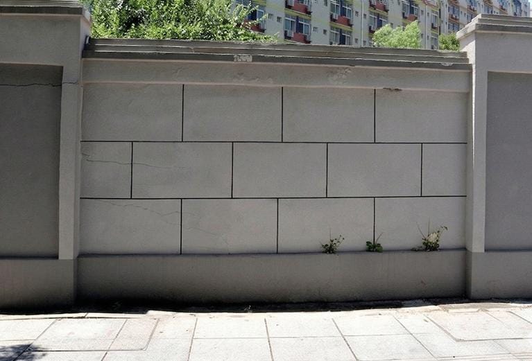 Wall after laser graffiti removal